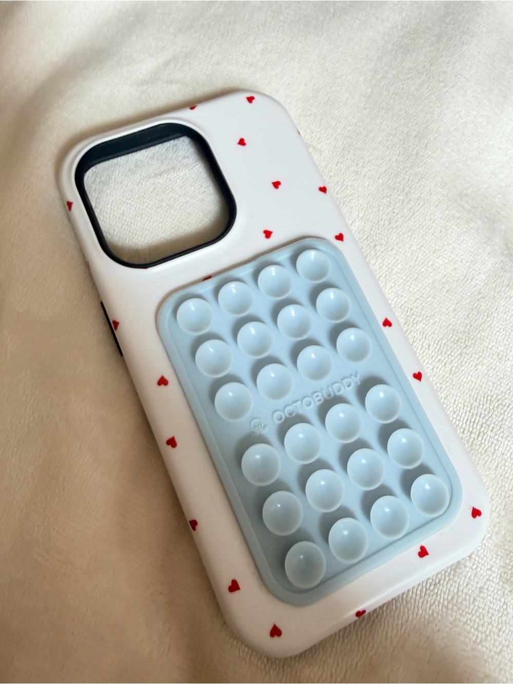 Casely | Be Mine Tiny Hearts | iPhone 14 Pro Case + Octobuddy